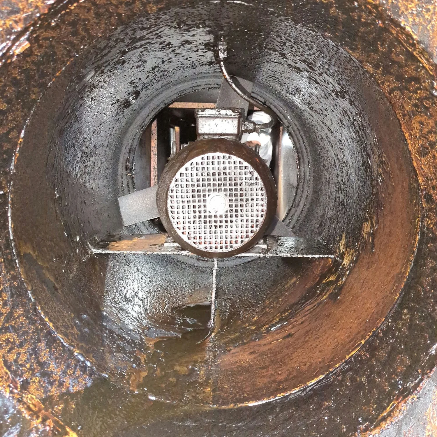 Circular exhaust fan before cleaning